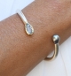 Preview: Armreif aus Silber und Gelbgold mit einem Aquamarin und einer Tahitiperle